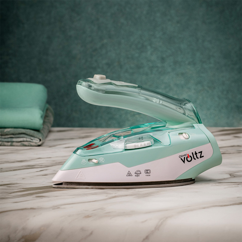 Σίδερο ταξιδιού Oliver Voltz OV51050K, 1100W, 55 ml, Πτυσσόμενη λαβή, Προστασία από υπερθέρμανση, Τυρκουάζ/Λευκό