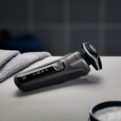 Ηλεκτρική ξυριστική μηχανή Philips Shaver Series 5000 S5887/10, 9 W, 60 λεπτά, Χρήση σε στεγνό ή βρεγμένο δέρμα, Ενσωματωμένο τρίμερ, SkinIQ, PowerAdapt, Κεφαλές 360°, Αυτοακονιζόμενες λεπίδες, Γκρι ανθρακί