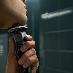 Ηλεκτρική ξυριστική μηχανή Philips Shaver Series 5000 S5887/10, 9 W, 60 λεπτά, Χρήση σε στεγνό ή βρεγμένο δέρμα, Ενσωματωμένο τρίμερ, SkinIQ, PowerAdapt, Κεφαλές 360°, Αυτοακονιζόμενες λεπίδες, Γκρι ανθρακί