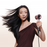 Στεγνωτήρας μαλλιών Dyson HD19 Travel™ 492457-01, 1220 W, 11,6 l/s, 2 ταχύτητες, 3 ρυθμίσεις θερμοκρασίας, Air Multiplier, Έξυπνος έλεγχος θερμοκρασίας, Κεραμικό ροζ/ροζ χρυσό